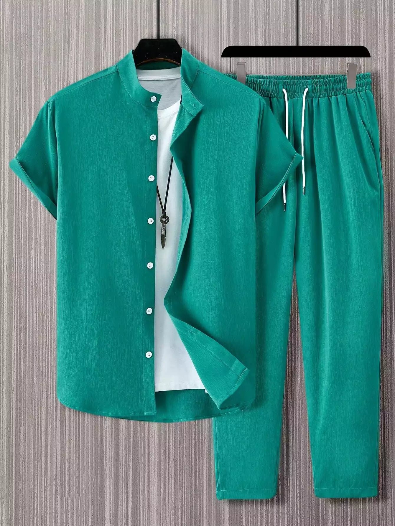 CLASSY_PLAIN_GREEN_1_1328c205-95a8-496b-9129-7d14de1b796d.jpg Plain Green Mens Full Set Trouser And Shirt Half Sleeves - Image 1